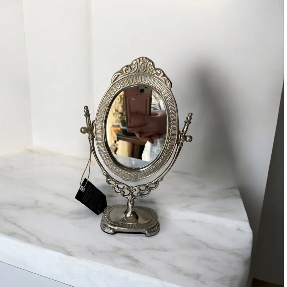 Silver tone metal antique style vanity mirror adjustable free standing 10” high